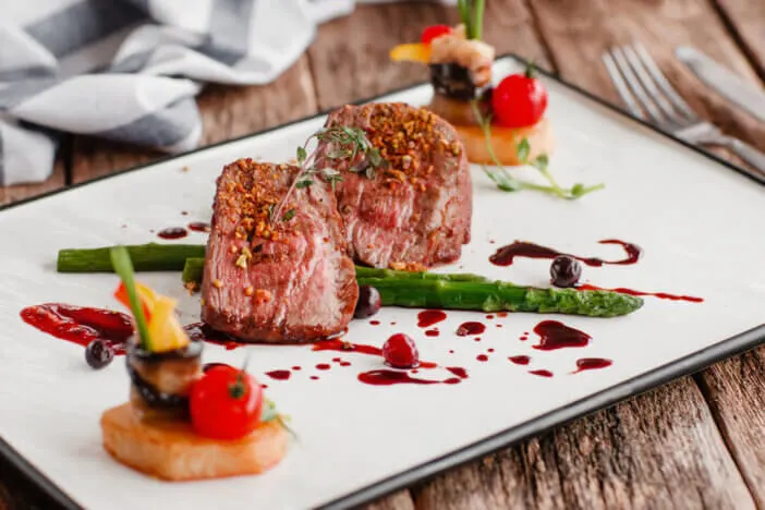 Delicate medallions of veal with vegetables