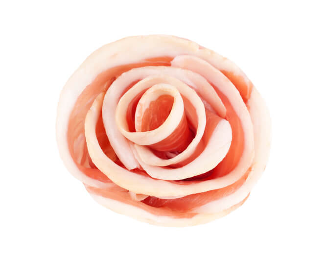 What Is Pork Rose Meat? 1 Raw slices of smoked bacon