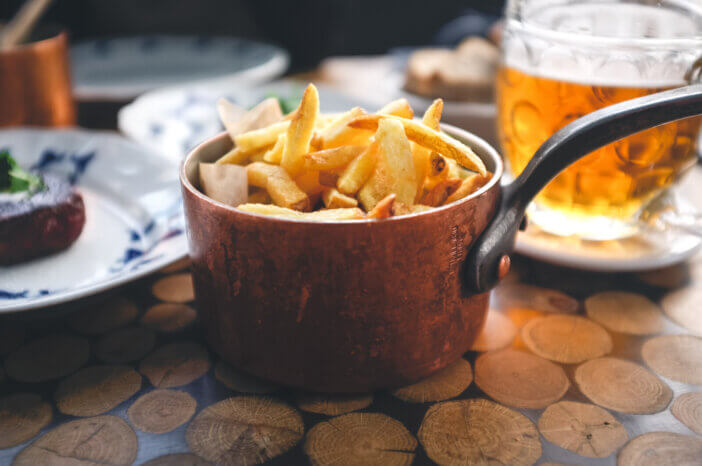 French fries with steak and beer