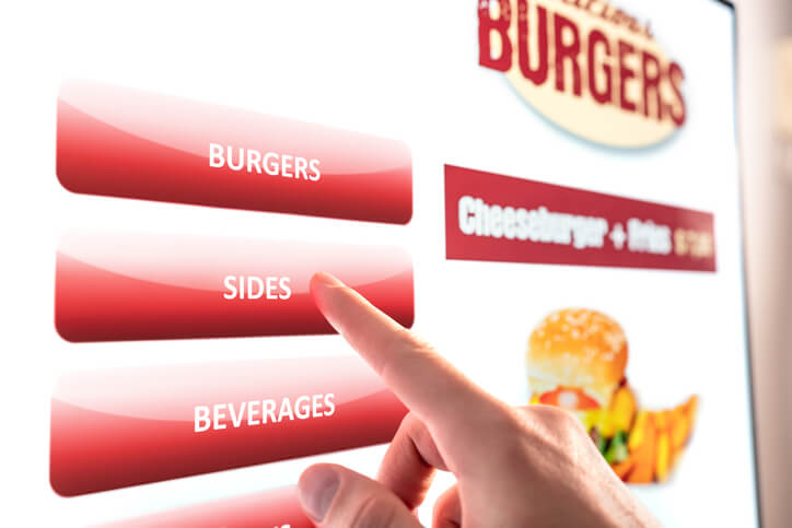 27+ New Fast Food Consumption Statistics 1 Self service and order kiosk in restaurant. Fast food touch screen, digital vending machine. Man using electronic menu and buying burger meal and paying with selfservice technology.