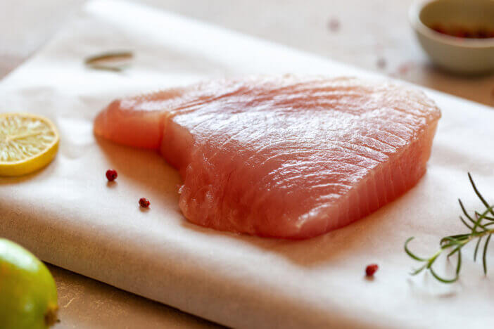 raw piece of tuna albacore fish, side view