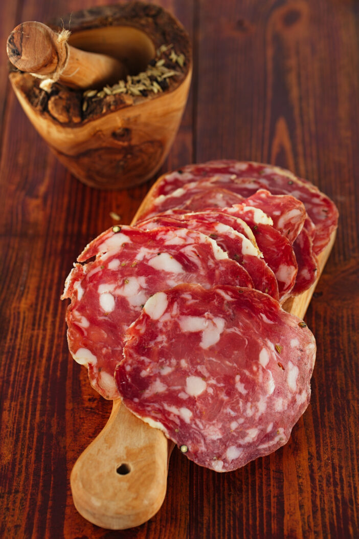 Finocchiona Salami on a wood with Fennel