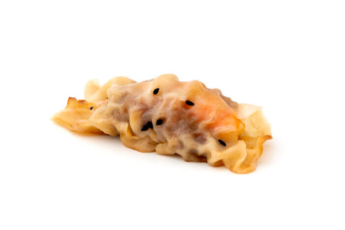 Guotie with minced pork and shrimps on a white background