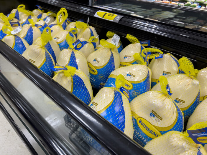 Lynnwood, WA USA - circa October 2022: Close up view of large Butterball Thanksgiving turkeys for sale inside a QFC grocery store.