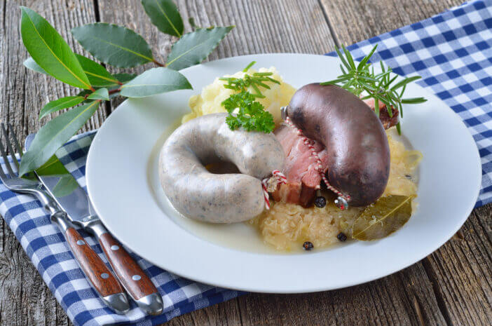 "Fresh black and white pudding, belly of pork, purree, sauerkraut"