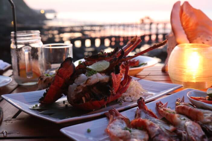 Beachside dining with lobster dinner