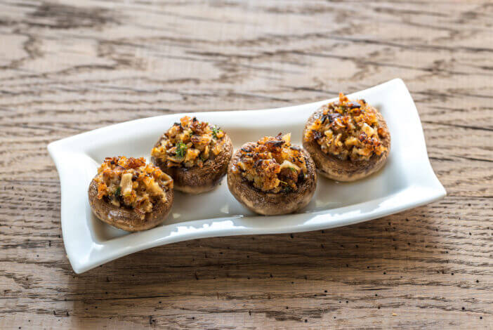 11+ Delicious Sides to Enjoy with Skirt Steak 4 Mushrooms' caps stuffed with mixture of cheese, onion, breadcrumbs and butter