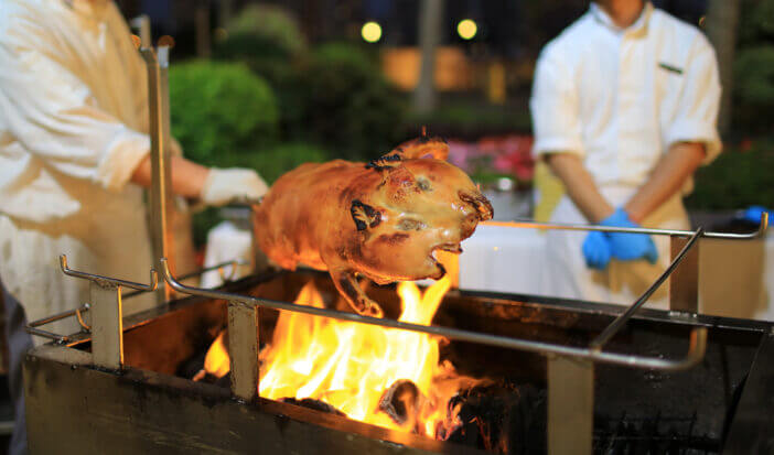 roast suckling pig in tradition celebration in chinese wildfire party in hong kong hotel