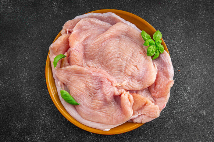 11 Low Fat Meat Options For Health & Fitness Enthusiasts 5 turkey fillet slice fresh poultry meat healthy eating cooking appetizer meal food snack on the table copy space food background rustic top view keto or paleo diet